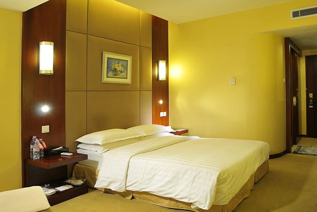 Maxcourt Hotel Чанчун Стая снимка